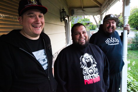 Members of A Tribe Called Red on DJ Shub (Dan General)'s porch near Ottawa: from left, Ian Campeau, Bear Thomas, Dan General