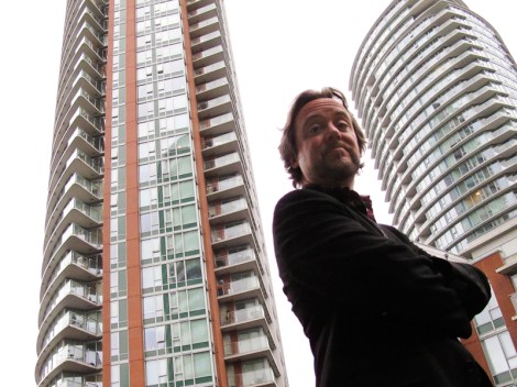 Matt Toner, in his False Creek apartment tower courtyard. Photo by David P. Ball