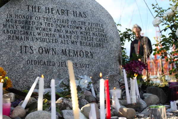 50 people gathering around CRAB Park's missing women's memorial stone to remember Bonnie Fournier. Photo by David P. Ball