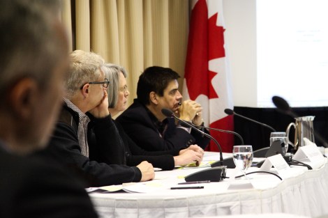 Members of the National Energy Board's Joint Review Panel, which conditionally approved the Enbridge pipeline proposal, listen to one of thousands of intervenors speak in Vancouver on Jan. 14, 2013. Photo by David P. Ball